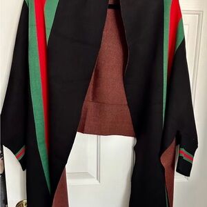 Stylish Black Poncho with Red and Green Stripes